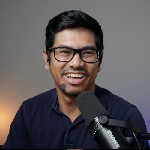 Patrick Galang recording a podcast